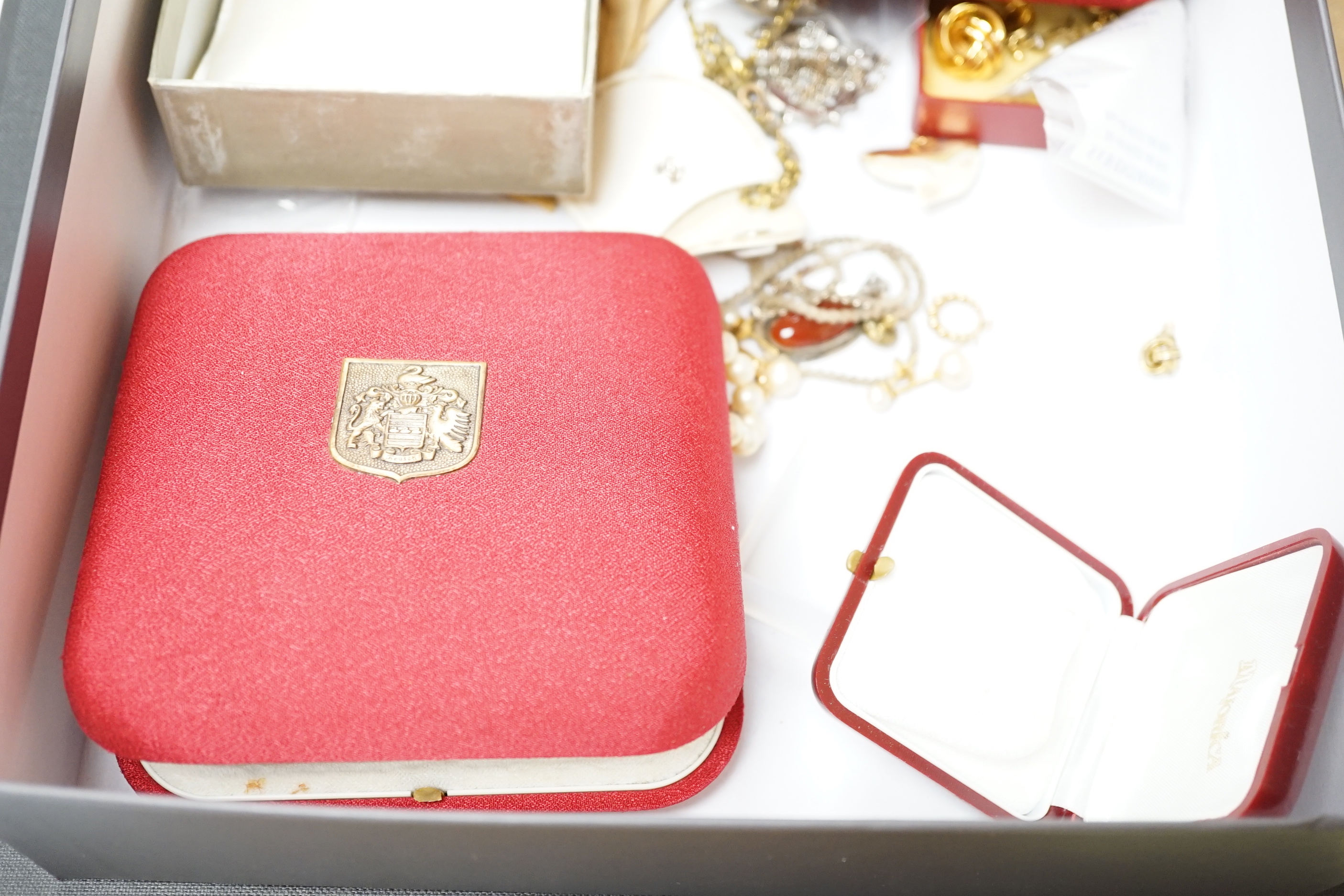 A quantity of assorted jewellery including costume, silver hinged bangle, etc.
